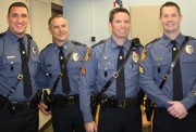 On page one, left to right, are Officer Kyle J. Kane, Chief Steven R. Peters, Sgt. Timothy P. Macom and Sgt. Patrick C. Martin.