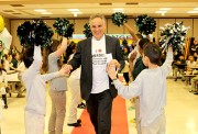 Long Branch Mayor Adam Schneider walks the "red carpet" and is welcomed by Anastasia School students.