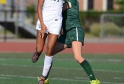 Leaping high and getting her head on the ball is Mya Daniels (17) a junior who scored the only Long Branch goal in the 6-1 loss to RBC.